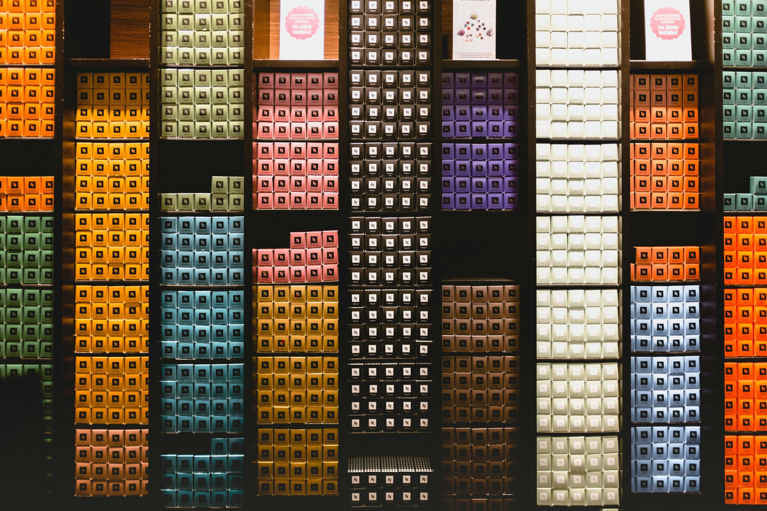 A photo showing an organized drugstore makeup aisle with vibrant colors.