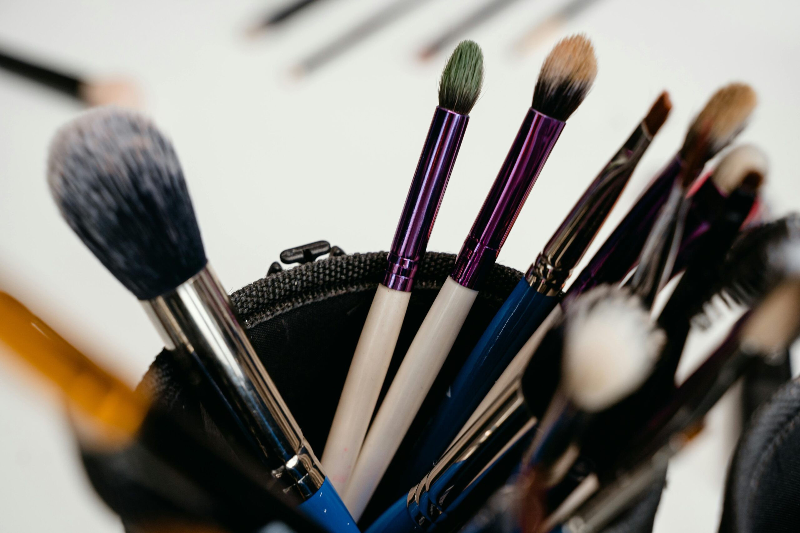 Affordable brush set laying next to popular drugstore makeup products