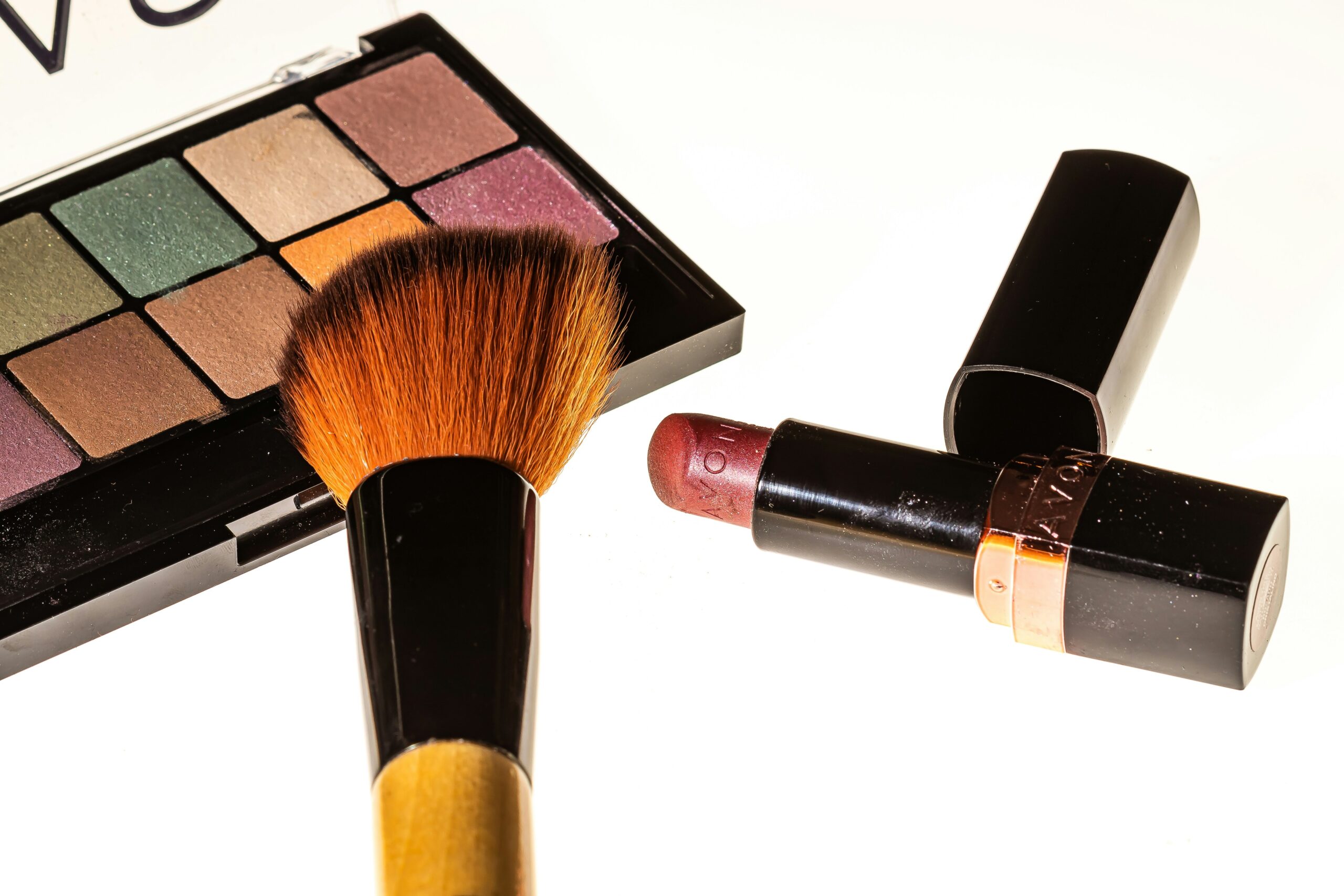 Beauty bloggers reviewing drugstore makeup items