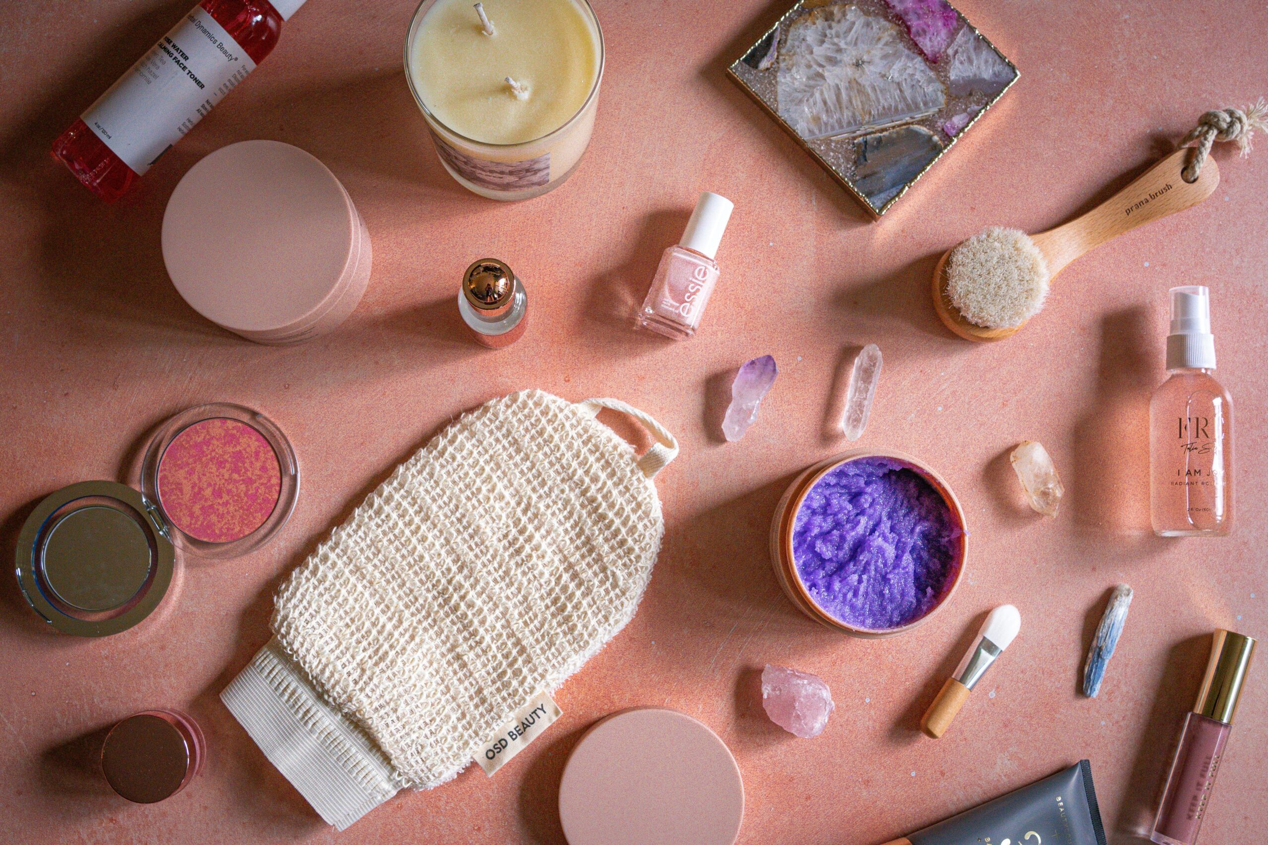 A photo of a crowded drugstore makeup aisle showcasing various affordable foundation options.