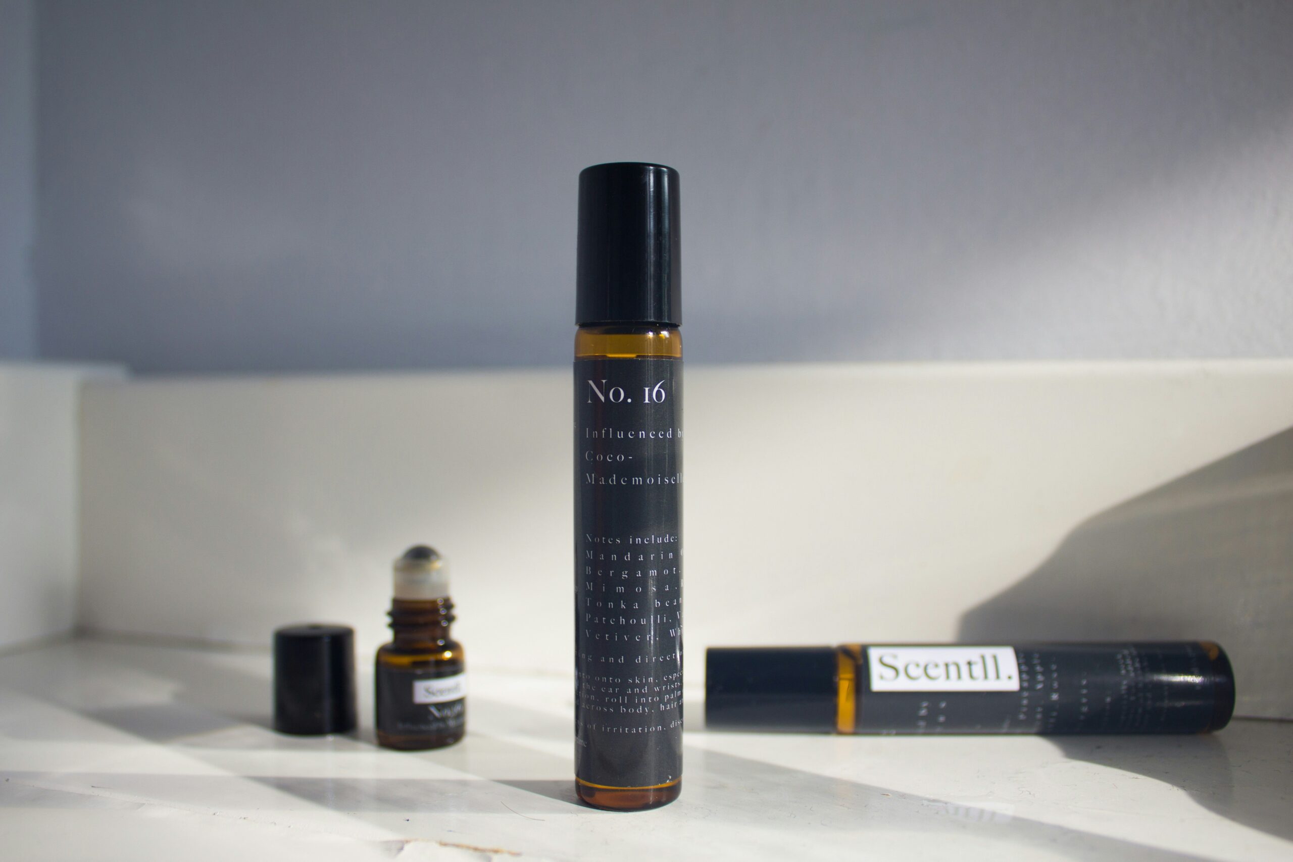 Close-up image showing correct technique of spraying setting spray in X and T motions.