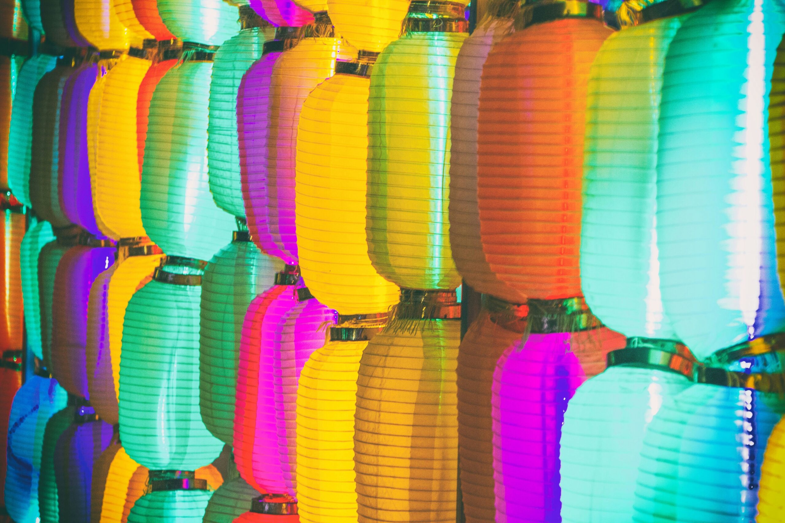 Shelf of colorful drugstore mascaras