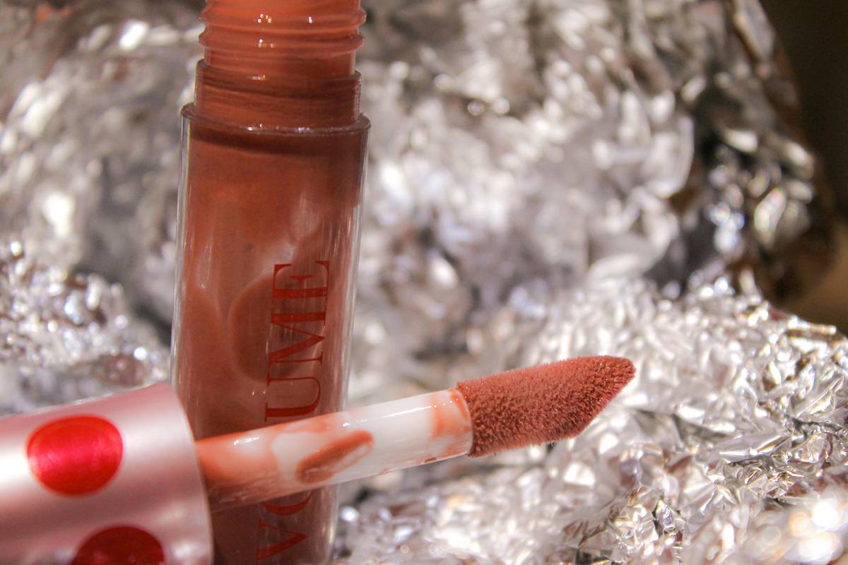 A chart displaying various lipstick shades matched with different skin tones and undertones.