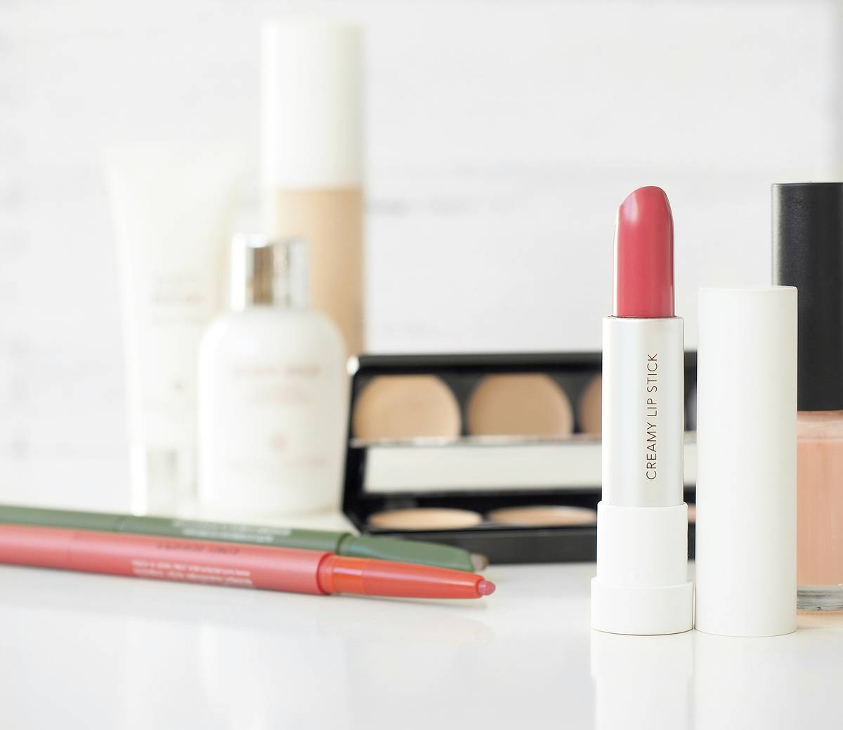 Before and after photo showing makeup transformation using affordable dupes